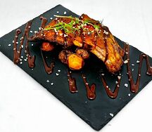 Томленые свиные ребрышки BBQ
