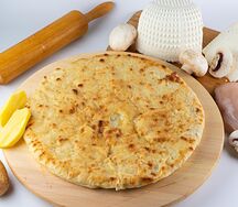 Пирог с курицей, грибами и картофелем