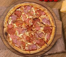Пицца Мясные деликатесы