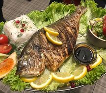 Рыба дорадо на углях