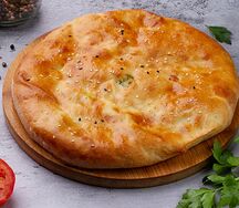 Осетинский пирог с мясом говядины и свинины