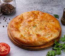 Осетинский пирог с курицей, картофелем и грибами