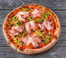 Пицца с ветчиной и грибами