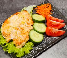 Отбивная из курицы с овощами