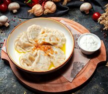 Вареники с мясом и шкварками