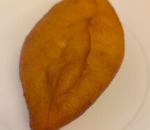 Пирожок с капустой жареный