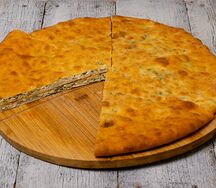 Осетинский пирог с сыром и зеленью
