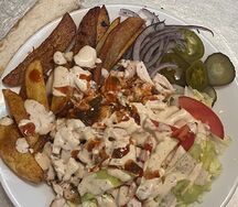 Шаурма куриная в тарелке