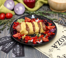 Свиная вырезка, запеченная с томатами и сыром