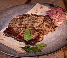 Cвинoй стейк