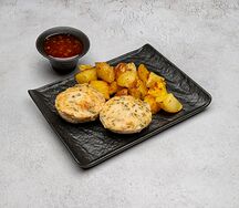 Духовые котлеты под сливочно-сырной шапкой