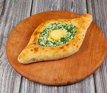 Хачапури по-аджарски со шпинатом и сыром