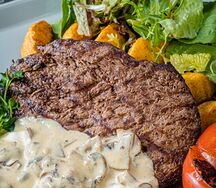 Говядина в грибном соусе