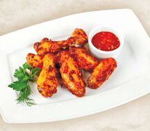Крылышки, жаренные с чесноком