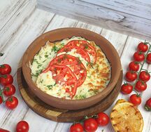 Запеченные помидоры под сыром