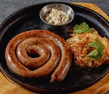 Колбаски бараньи с тушёной квашеной капустой