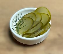 Огурец маринованный