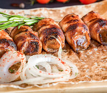 Печень говяжья в беконе