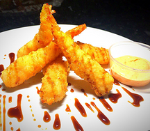 Королевские креветки в панировке с соусом айоли