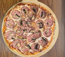 Пицца с ветчиной и грибами