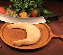 Гурийский хачапури с сыром и яйцом