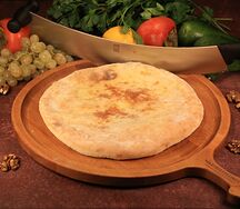 Кубдари с рубленой свининой и специями