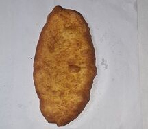 Пирожок с картошкой жареный