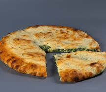 Осетинский пирог с сыром и зеленью