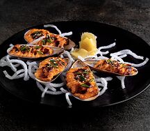 Мидии под сырным соусом