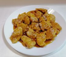 Курица в кляре в апельсиновом соусе