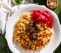 Плов с бараниной и гурийской капустой