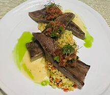 Стейк из говяжьего языка с овощным кус-кусом