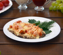 Антрекот из говядины с сыром и овощами