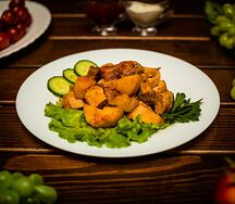 Картофель тушеный со свининой