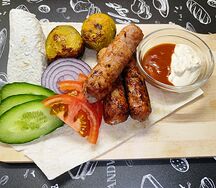 Колбаски на мангале