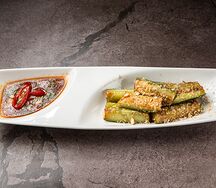 Битые огурцы с ореховым соусом