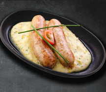 Фирменные колбаски из свининой с ароматным беконом и фисташками