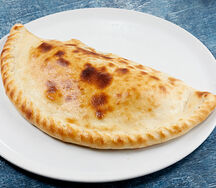 Кальцоне с ветчиной и грибами 21 см