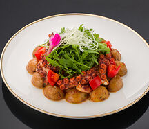 Теплый салат из осьминога