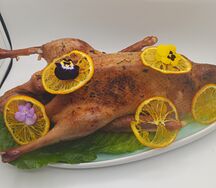 Утка, запеченная в каменной печи