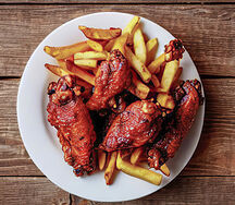 Zedlander spice wings with fries