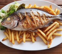 Whole bream fish with fries