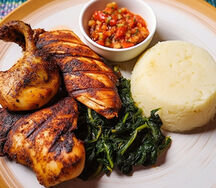 Nshima with charcoal grilled chicken