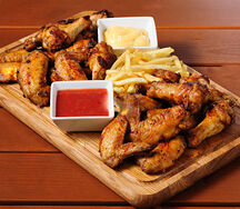Poulet grillé sur planche