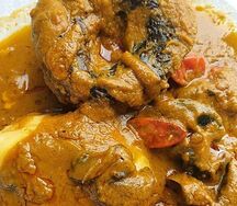 Foutou banane brochet fumé sauce Graines 