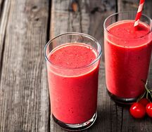 Tomato in a cherry strawberry smoothie