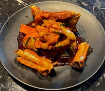 Свиные ребрышки в кисло-сладком соусе