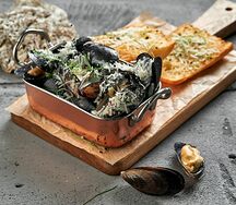 Мидии в соусе Пармеджано