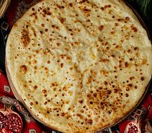 Хачапури по-мегрельски с брынзой и сулугуни