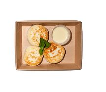 Сырники с цедрой апельсина и муссом на основе белого шоколада